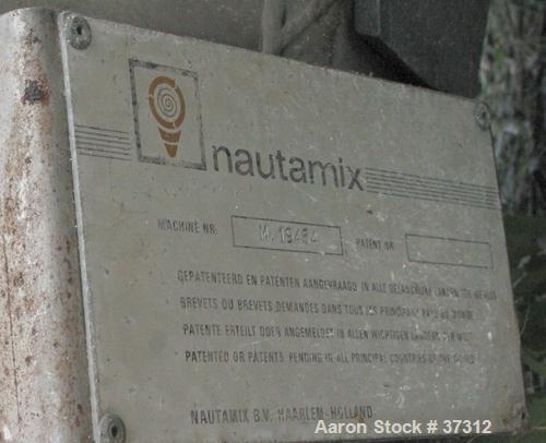 Used Nauta Mixer, ModelMBX 350, 304 Stainless Steel. 35 Cubic feet, 55" diameter x 84" straight side. Jacket top portion (water circulating only). Flat top cover, bolt down, 1/3 hinged. Bottom univer...