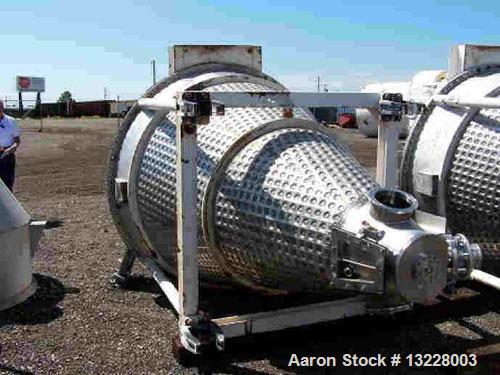 Used 70 cubic feet JH Day model MBX 700 Nauta vacuum dryer-mixer.  Stainless steel construction, 40 hp main drive, 2 hp drive for orbiting of screw, internals are highly polished finish. With stainle...