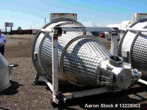 Used- 70 cubic feet JH Day model MBX 700 Nauta vacuum dryer-mixer.  Stainless steel construction, 40 hp main drive, 2 hp dri...