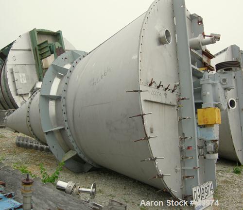 USED:Nauta mixer, type MBX100R, 304 stainless steel construction.12'2" diameter x 16'6" straight side. 3740mm diameter x 5085mm mixingchamber. 352 cu ft working capacity (10,000 liter). Not jacketed ...