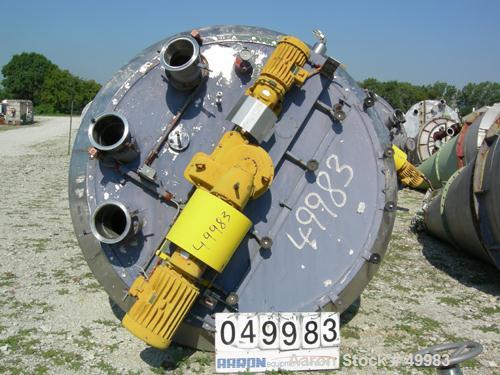 USED: Nauta mixer, type mbx40r. Stainless steel construction. 7'7" dia x 11'5" st side (2381 mm dia x 3550 mm st side). 141 cu ft working capacity (4000 liter). Not jacketed and not rated for vacuum....