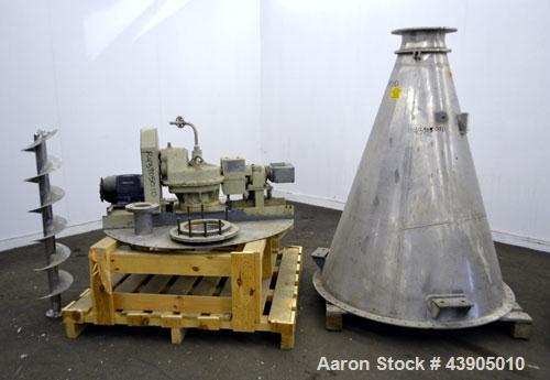 Used Vrieco Nauta Mixer, Approximately 6.9 Cubic Feet Working Capacity (195 Liter), 304 Stainless Steel.  Approximately 48" diameter x 66-1/2" cone height, bolt on flat top with 1", 3", (2) 4", 10" o...