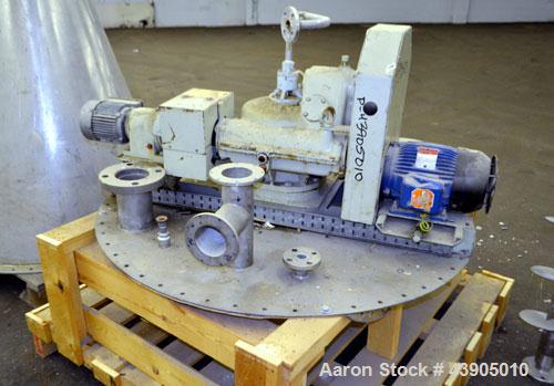 Used Vrieco Nauta Mixer, Approximately 6.9 Cubic Feet Working Capacity (195 Liter), 304 Stainless Steel.  Approximately 48" diameter x 66-1/2" cone height, bolt on flat top with 1", 3", (2) 4", 10" o...