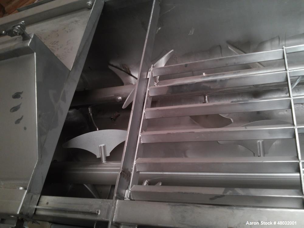 Used CSE Twin Shaft Paddle Mixer. 104 cubic foot working capacity. Heavy duty, stainless steel construction. 17' 8" x 5" x 8 4", total weight: 6,000 lbs. Sliding partial cover arrangement that cantil...