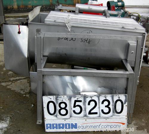 USED: Twin Shaft Paddle Mixer, 15 cubic feet working capacity, 304 stainless steel. Non-jacketed trough 25" wide x 48" long x approximately 19" deep. 3" diameter shaft with (10) 5" wide x 2-1/2" tall...