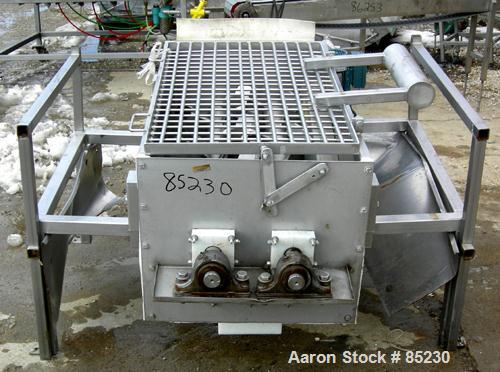 USED: Twin Shaft Paddle Mixer, 15 cubic feet working capacity, 304 stainless steel. Non-jacketed trough 25" wide x 48" long x approximately 19" deep. 3" diameter shaft with (10) 5" wide x 2-1/2" tall...