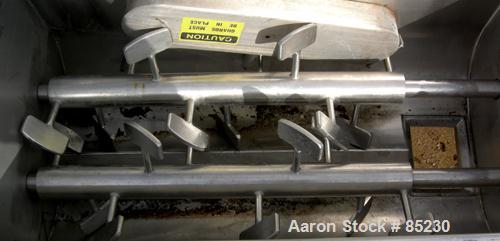 USED: Twin Shaft Paddle Mixer, 15 cubic feet working capacity, 304 stainless steel. Non-jacketed trough 25" wide x 48" long x approximately 19" deep. 3" diameter shaft with (10) 5" wide x 2-1/2" tall...
