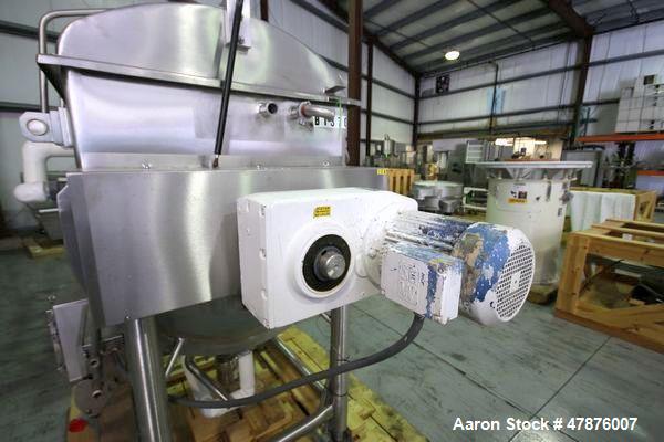 Used APV Crepaco Blender.  Aprox. 20 Cubic Ft., Jacketed Trough, Dual Wing Mixing Blade, 75 PSI @ 350 F, -20 F @ 75 PSI, Sprayball, Agitation Motor, Tri-Clover Air Valve, Hinged Top Cover, Mounted on...