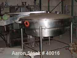 Used Albany Engineered Systems Fine Curd Cheese Saver, Model 3865, Stainless Steel. Approximately 48" diameter. Agitator paddles. Single lift lid cover. 2" inspection lid, 1-1/2" tri clamp inlets. 4"...