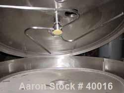 Used Albany Engineered Systems Fine Curd Cheese Saver, Model 3865, Stainless Steel. Approximately 48" diameter. Agitator paddles. Single lift lid cover. 2" inspection lid, 1-1/2" tri clamp inlets. 4"...