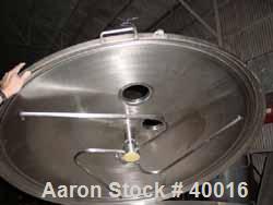 Used Albany Engineered Systems Fine Curd Cheese Saver, Model 3865, Stainless Steel. Approximately 48" diameter. Agitator paddles. Single lift lid cover. 2" inspection lid, 1-1/2" tri clamp inlets. 4"...