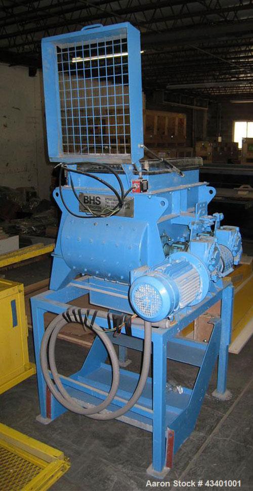 Used BHS Twin Shaft Batch Mixer.  It has a 60 liter capacity in the hopper and is stainless steel.  Footprint is 3' x 3' and 5' high.  It has a VFD inside a control panel and manual.  The mixer is 3 ...