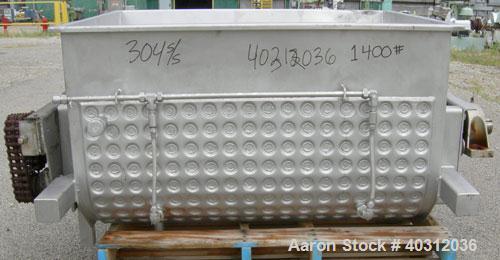 Used Custom Metalcraft Dual Shaft Paddle Mixer, 15 cubic feet, model DRB-15, 304 stainless steel. Dimpled jacketed tapered trough 39'' wide x 48'' long x 25'' deep. (10) approximately 4 1/2'' wide x ...