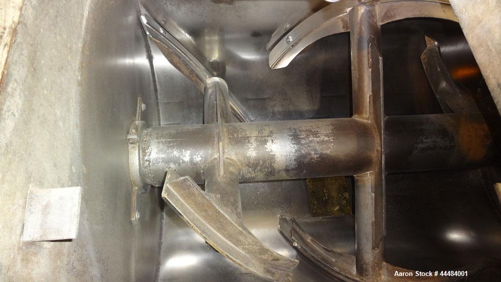 Used H.C. Davis Ultimate Duty Paddle Blender, 18 Cubic Feet Working Capacity, Carbon Steel. Non-Jacketed trough 31" wide x 45" long x approximately 36" deep. 6" Diameter shaft, (12) paddles welded to...