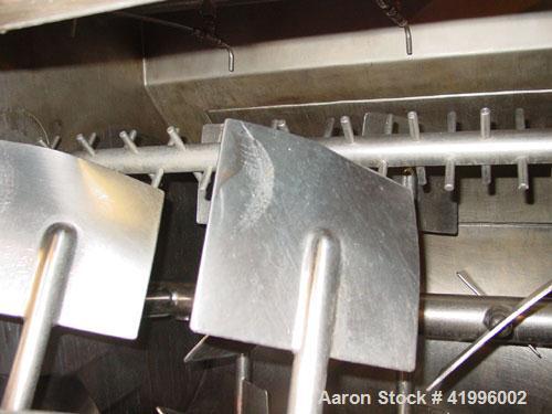 Used Halvor Forberg Twin Shaft Fluidizer, Model 795, Stainless Steel. Chamber approximately 52’’ long x 60’’ wide. (2) 3-1/2’’ diameter shafts with (14) paddles per shaft,  paddles 9-1/4’’ x 10’’ wel...