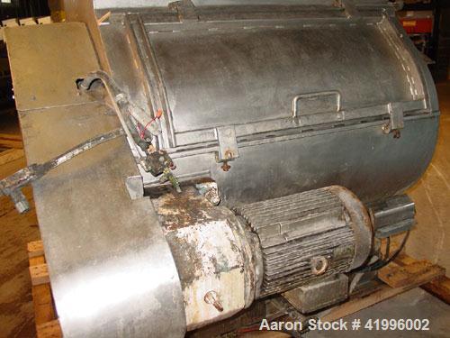 Used Halvor Forberg Twin Shaft Fluidizer, Model 795, Stainless Steel. Chamber approximately 52’’ long x 60’’ wide. (2) 3-1/2’’ diameter shafts with (14) paddles per shaft,  paddles 9-1/4’’ x 10’’ wel...