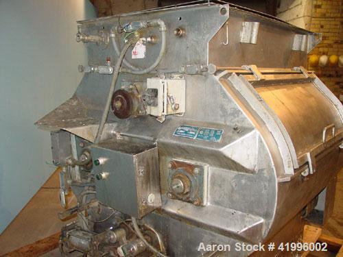 Used Halvor Forberg Twin Shaft Fluidizer, Model 795, Stainless Steel. Chamber approximately 52’’ long x 60’’ wide. (2) 3-1/2’’ diameter shafts with (14) paddles per shaft,  paddles 9-1/4’’ x 10’’ wel...