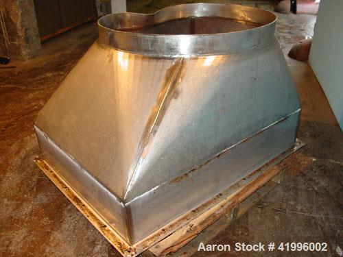 Used Halvor Forberg Twin Shaft Fluidizer, Model 795, Stainless Steel. Chamber approximately 52’’ long x 60’’ wide. (2) 3-1/2’’ diameter shafts with (14) paddles per shaft,  paddles 9-1/4’’ x 10’’ wel...