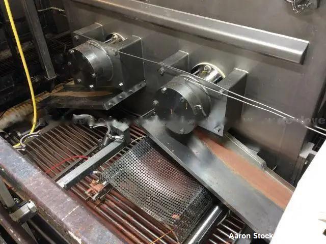 Used Karl Schnell Paddle Mixer, Stainless Steel. Approximately 140 cubic feet, 4000 Liter capacity. Has stainless steel feed hopper with dual screw conveyors, driven by (2) Approximate 5.4HP drive ge...
