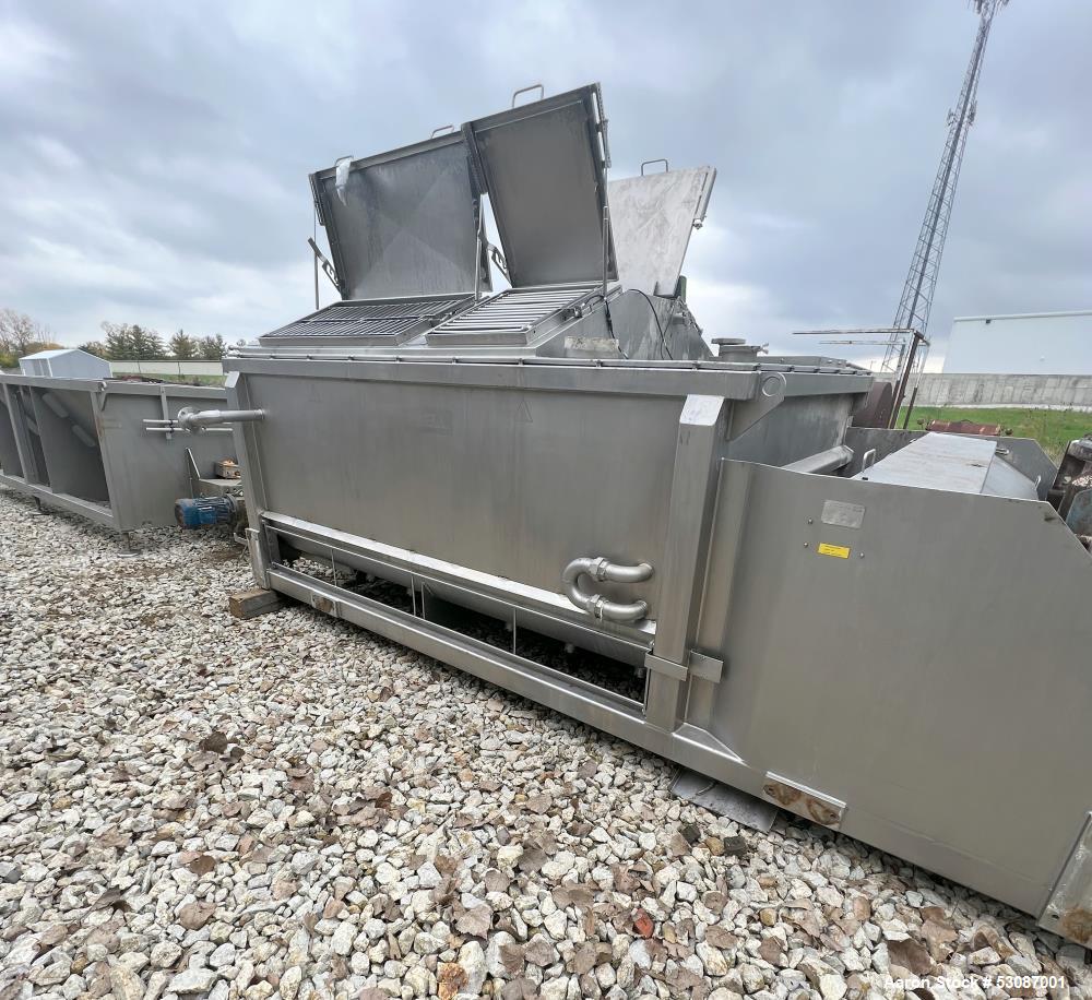 Used Karl Schnell Paddle Mixer, Stainless Steel. Approximately 140 cubic feet, 4000 Liter capacity. Has stainless steel feed hopper with dual screw conveyors, driven by (2) Approximate 5.4HP drive ge...