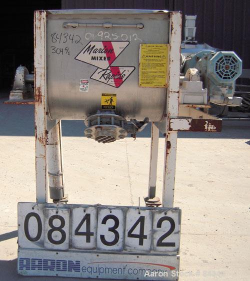Used Marion Paddle Mixer, Model 6001. 3.5 cubic feet working capacity (5 total), 304 stainless steel. Non-jacketed trough 18" wide x 24" long x approximately 21" deep, 2" diameter shaft with (4) weld...