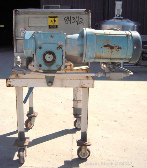 Used Marion Paddle Mixer, Model 6001. 3.5 cubic feet working capacity (5 total), 304 stainless steel. Non-jacketed trough 18" wide x 24" long x approximately 21" deep, 2" diameter shaft with (4) weld...