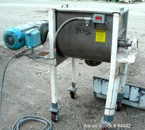 Used Marion Paddle Mixer, Model 6001. 3.5 cubic feet working capacity (5 total), 304 stainless steel. Non-jacketed trough 18" wide x 24" long x approximately 21" deep, 2" diameter shaft with (4) weld...