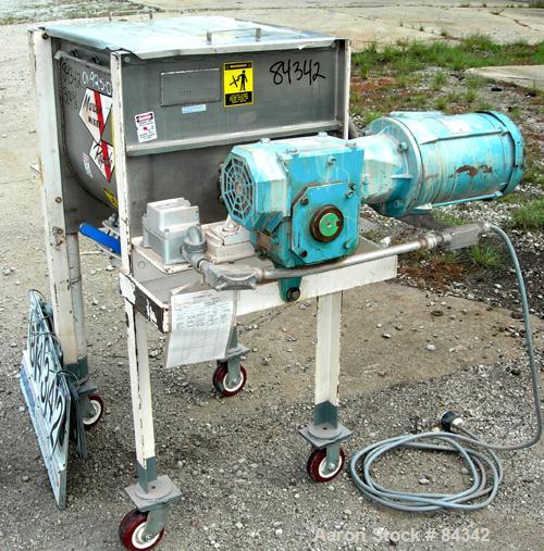Used Marion Paddle Mixer, Model 6001. 3.5 cubic feet working capacity (5 total), 304 stainless steel. Non-jacketed trough 18" wide x 24" long x approximately 21" deep, 2" diameter shaft with (4) weld...