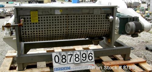 USED: Marion Continuous Paddle Mixer, model C2472. 4.3 to 15.4 cubic feet working capacity, 304 stainless steel. Dimple jacketed trough 24" wide x 72" long x approximately 27" deep, rated 125 psi at ...