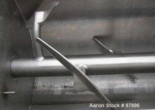 USED: Marion Continuous Paddle Mixer, model C2472. 4.3 to 15.4 cubic feet working capacity, 304 stainless steel. Dimple jacketed trough 24" wide x 72" long x approximately 27" deep, rated 125 psi at ...