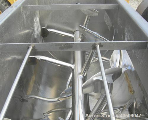 Used Marion Semi-Cylindrical Paddle Mixer, Model SPY66144, approximately 300 cubic feet working capacity, 304 stainless steel. Non-jacketed trough 55 1/2" wide at top opening to approximately 66" wid...