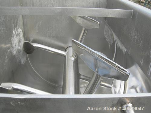 Used Marion Semi-Cylindrical Paddle Mixer, Model SPY66144, approximately 300 cubic feet working capacity, 304 stainless steel. Non-jacketed trough 55 1/2" wide at top opening to approximately 66" wid...