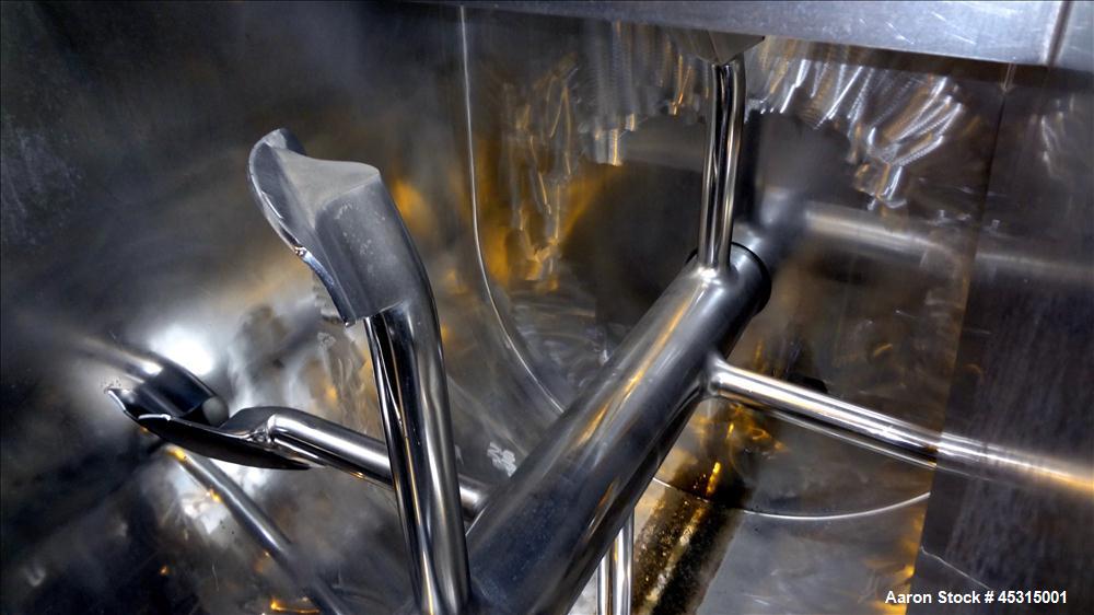 Used Marion Semi-Cylindrical Paddle Mixer, approximately 300 cubic feet working capacity, 304 stainless steel. Non-jacketed trough 55-1/2" wide at top opening to approximately 66" wide inside x 144" ...