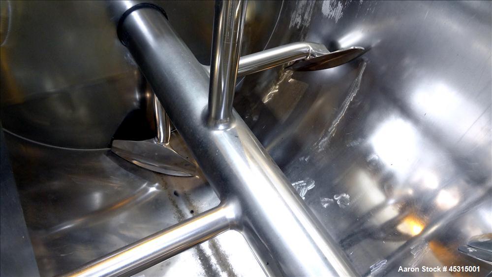 Used Marion Semi-Cylindrical Paddle Mixer, approximately 300 cubic feet working capacity, 304 stainless steel. Non-jacketed trough 55-1/2" wide at top opening to approximately 66" wide inside x 144" ...
