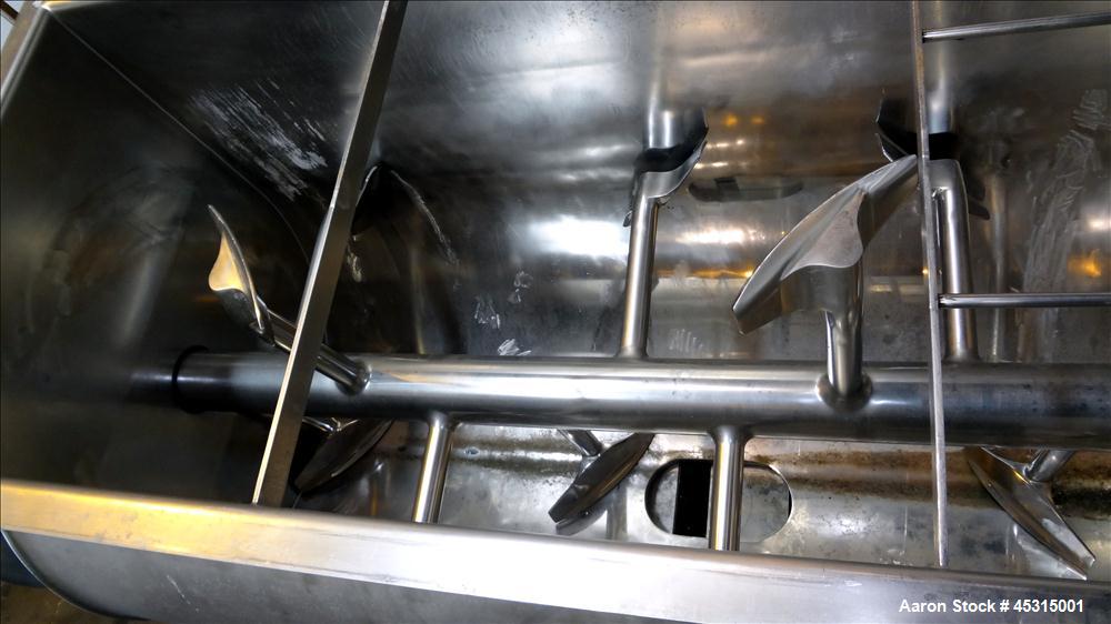 Used Marion Semi-Cylindrical Paddle Mixer, approximately 300 cubic feet working capacity, 304 stainless steel. Non-jacketed trough 55-1/2" wide at top opening to approximately 66" wide inside x 144" ...