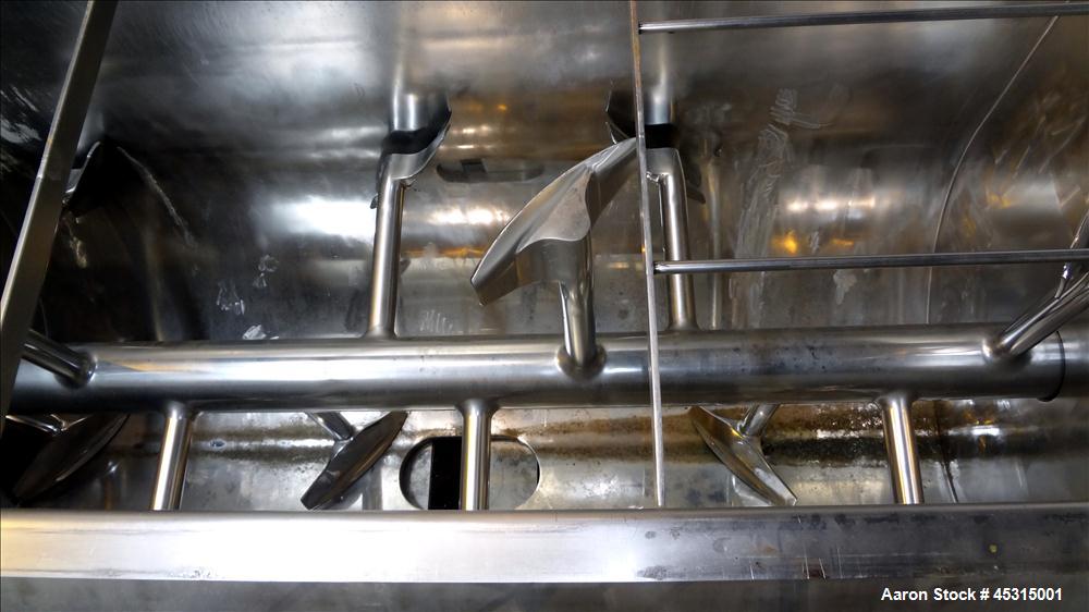 Used Marion Semi-Cylindrical Paddle Mixer, approximately 300 cubic feet working capacity, 304 stainless steel. Non-jacketed trough 55-1/2" wide at top opening to approximately 66" wide inside x 144" ...