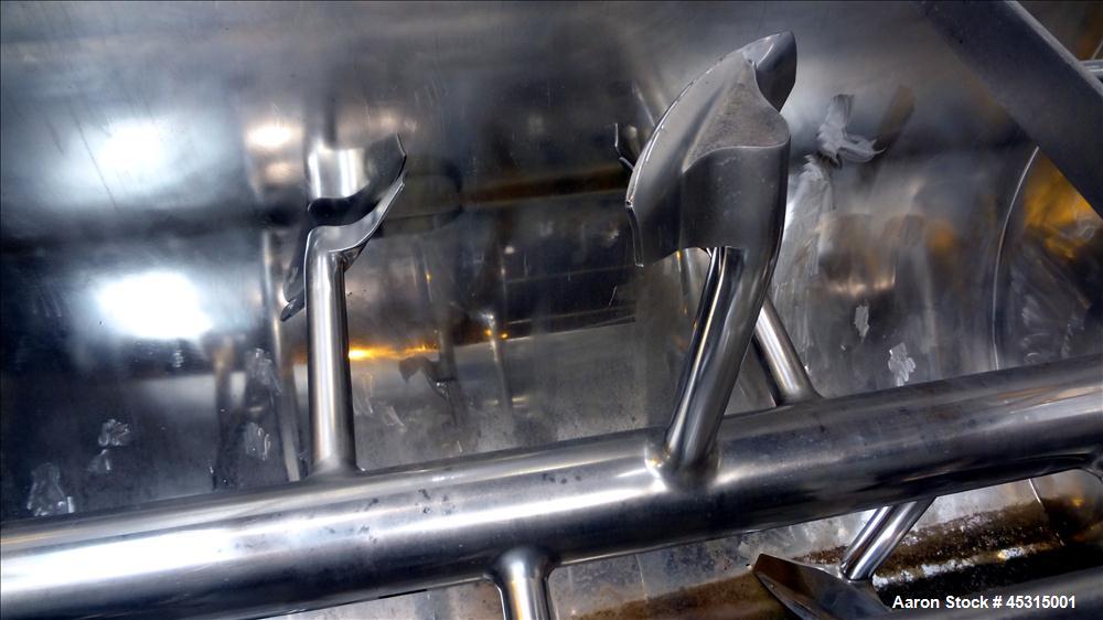 Used Marion Semi-Cylindrical Paddle Mixer, approximately 300 cubic feet working capacity, 304 stainless steel. Non-jacketed trough 55-1/2" wide at top opening to approximately 66" wide inside x 144" ...