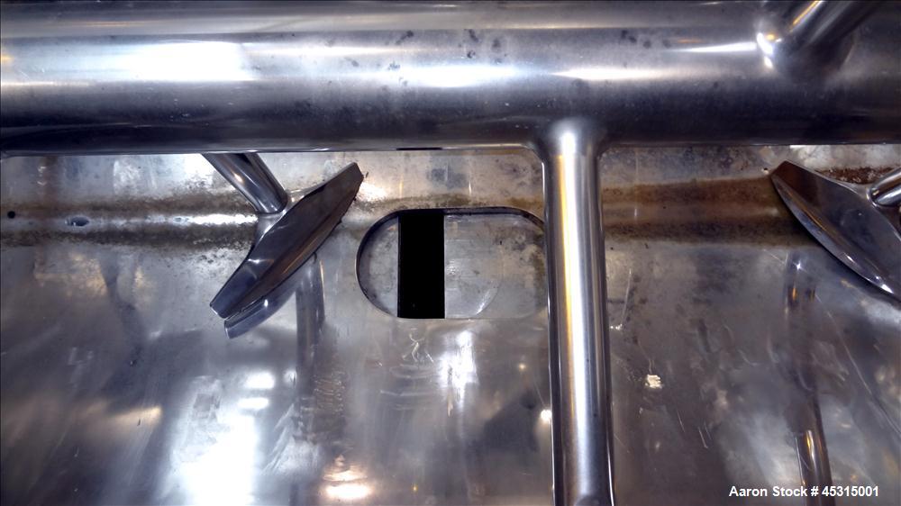 Used Marion Semi-Cylindrical Paddle Mixer, approximately 300 cubic feet working capacity, 304 stainless steel. Non-jacketed trough 55-1/2" wide at top opening to approximately 66" wide inside x 144" ...