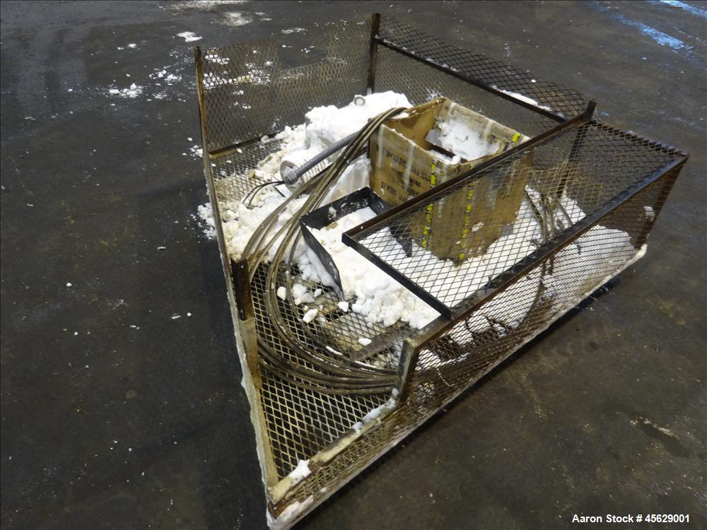 Used Marion Paddle Mixer, Approximately 200 Cubic Feet, Carbon Steel. Non-jacketed trough 144" long x 52" wide x 50" deep. 260 rpm. 4" diameter shaft with (7) 18" wide paddles driven by a 30 hp, 3/60...