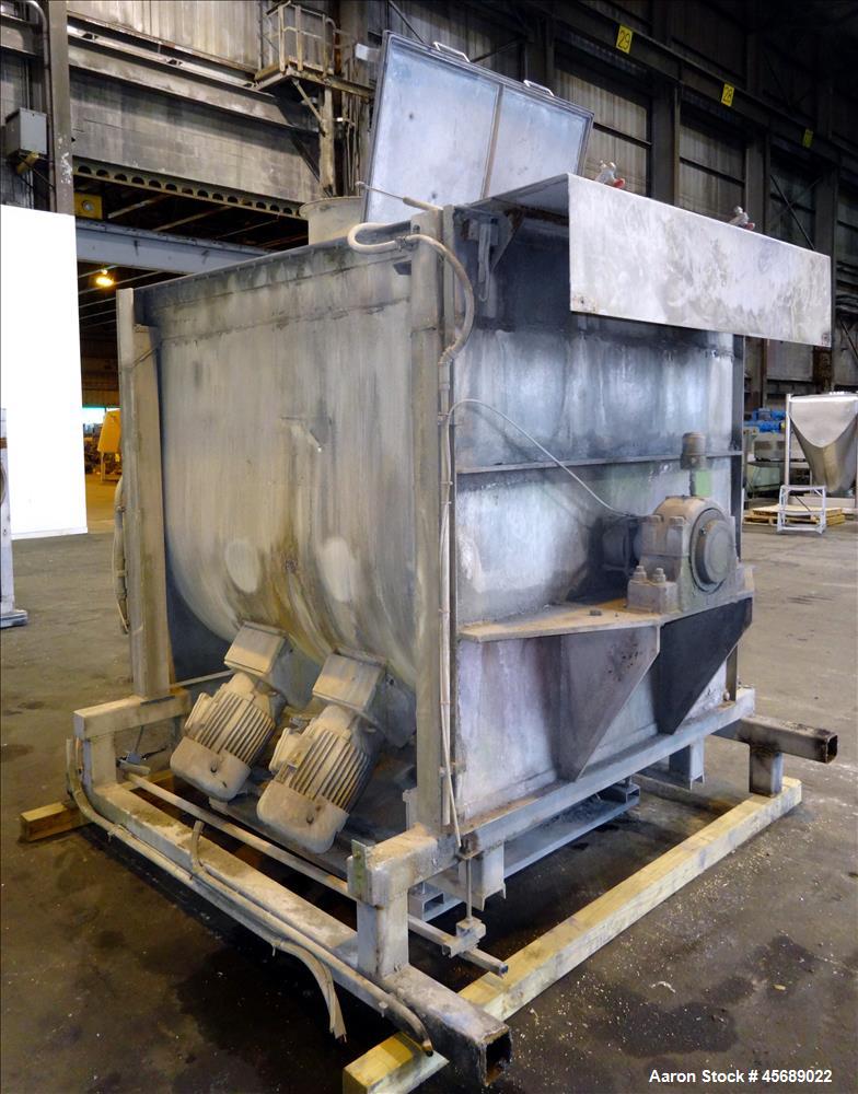 Used Marion Paddle Mixer, 304 Stainless Steel. Approximate 109 cubic feet/500 Pound Working Capacity. Non-jacketed tough approximately 73" long x 54" wide x 64" deep, 5" diameter shaft with (6) paddl...