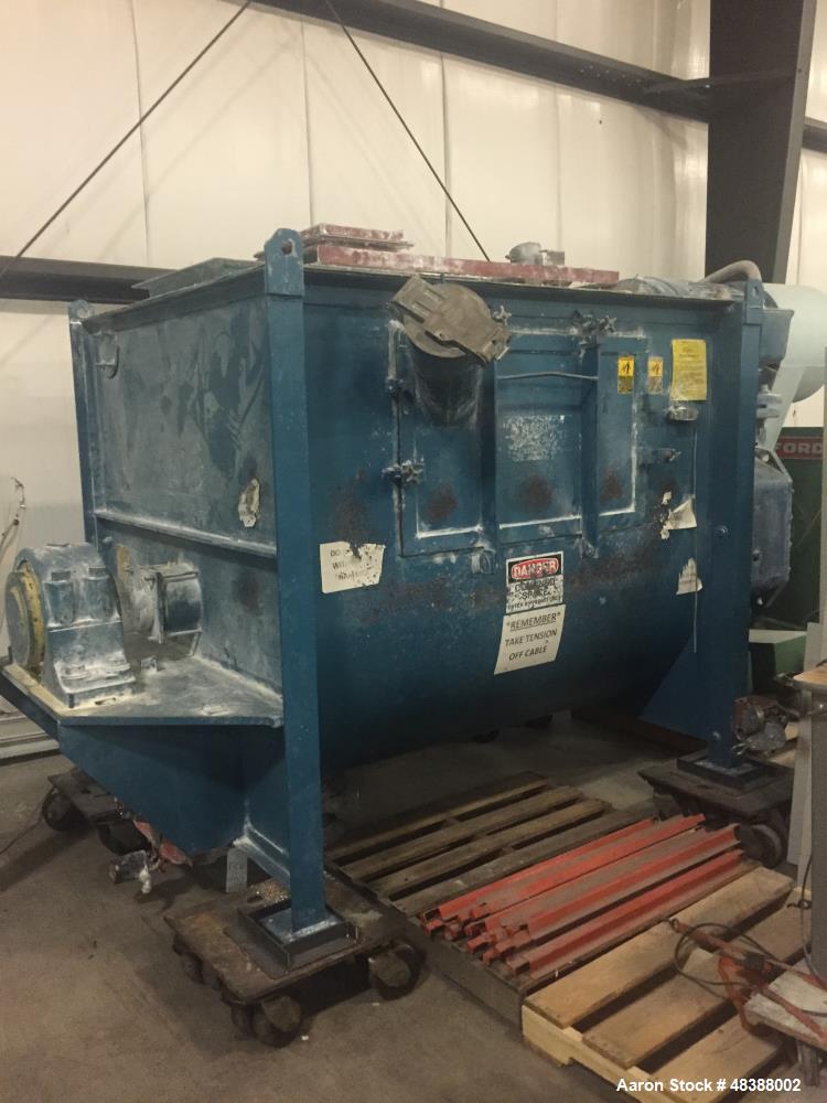 Used Marion Paddle Mixer, Model # HPC5474. Carbon Steel. Approximately 100 cubic feet. 54" wide x 74" long x 64 1/2" deep, 100 hp drive, 3/60, 1785 rpm, 460 volt. 111 amps.  8" diameter center shaft....