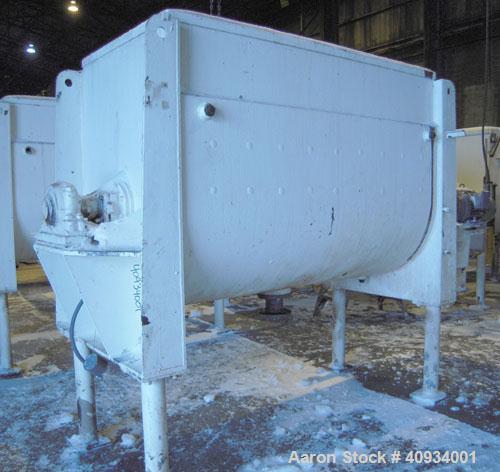 Used McCarter Corp Chocolate Mixer, approximately 76 cubic feet (560 gallon), carbon steel. Jacketed trough approximately 42'' wide x 84'' long x 56'' deep, rated 40 psi at 275 deg F. Approximate 5''...