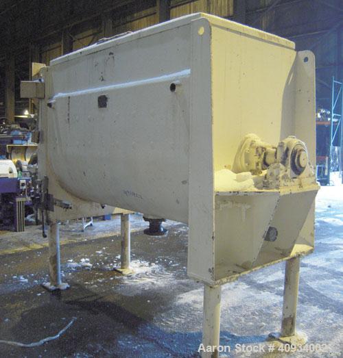 Used McCarter Corp Chocolate Mixer, approximately 76 cubic feet (560 gallon), carbon steel. Jacketed trough approximately 42'' wide x 84'' long x 56'' deep, rated 40 psi at 275 deg F. Approximate 5''...