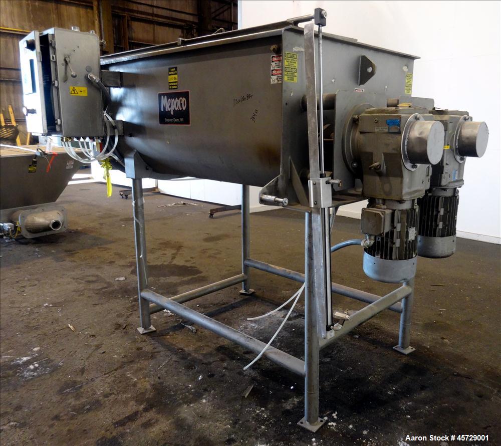 Used Mepaco Twin Shaft Paddle Mixer, Model 170, 2000 Pound Working Capacity (40 Cubic Feet), 304 Stainless Steel. Non-jacketed trough 71" long x 45" wide x 30" deep. (2) 3" Diameter shafts with 12 we...