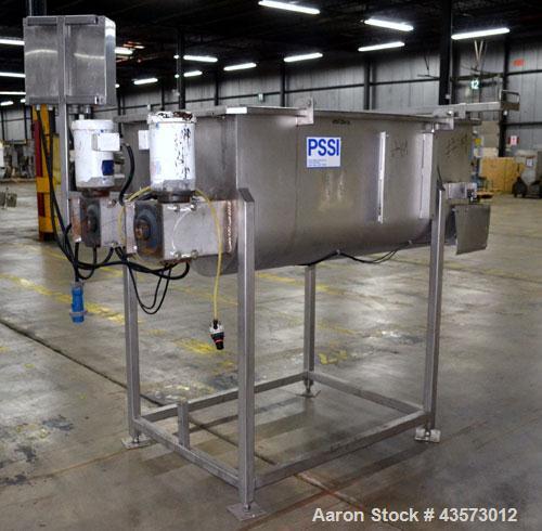 Used PSSI Twin Shaft Paddle Mixer, Approximate 33 Cubic Feet Working Capacity, 304 Stainless Steel. Non-jacketed trough 33-1/2" wide x 60" long x approximate 17-3/4" deep. Top hinged safety grate, du...