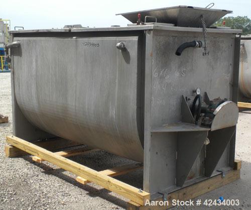 Used Scott Equipment Paddle Mixer, 100 Cubic Feet Capacity, 304 Stainless Steel. Stainless steel jacketed trough 96" long x 48" wide x approximately 54" deep. Bolt down top cover with hinged openings...