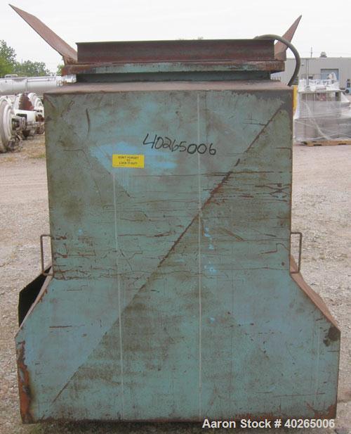 Used Weiler Paddle Mixer, Approximately 40 Cubic Feet Capacity, Carbon Steel. Non-jacketed trough 36" wide x 60" long x 41" deep. 6" diameter shaft, (8) 17" wide weld on paddles, posts 1" thick x  6"...