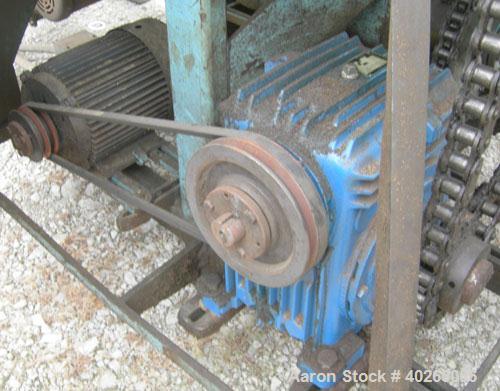Used Weiler Paddle Mixer, Approximately 40 Cubic Feet Capacity, Carbon Steel. Non-jacketed trough 36" wide x 60" long x 41" deep. 6" diameter shaft, (8) 17" wide weld on paddles, posts 1" thick x  6"...