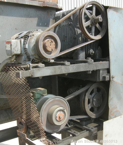 Used Weiler Paddle Mixer, Approximately 48 Cubic Foot Capacity, Carbon Steel. Trough measures 36" wide x 72" long x 50" deep.6" diameter screw discharge, 3" pitch.(4) paddle posts are 1" thickx 6" wi...
