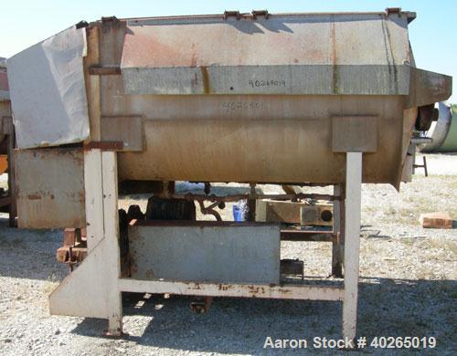 Used Twin Shaft Paddle Mixer, approximately 188 cubic feet working capacity, 316 stainless steel.Jacketed trough 66" wide x 84" long x approximately 44" deep.2 piece top cover.(2) 6" diameter carbon ...